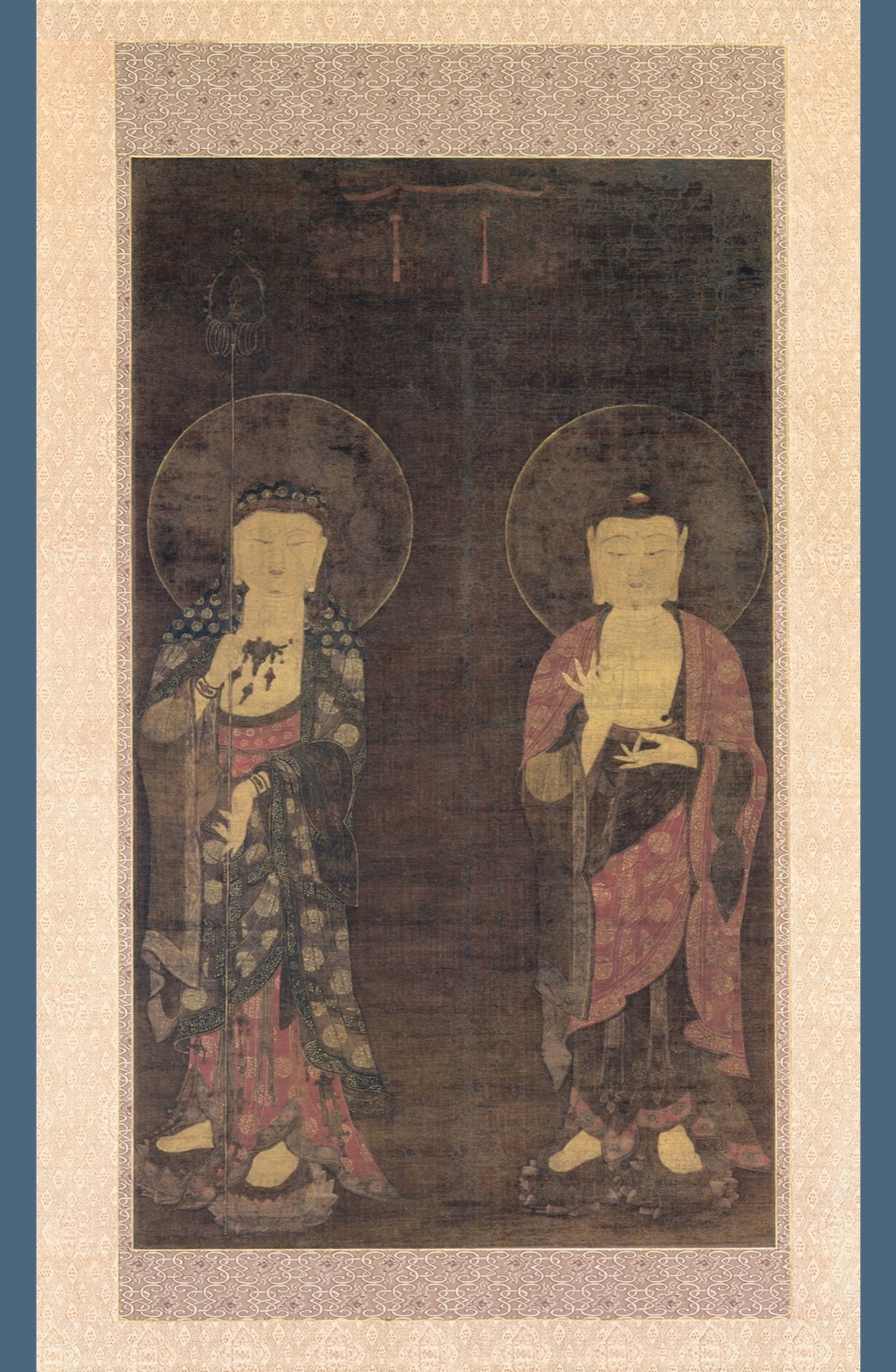 Kshitigarbha with a ringed staff standing beside Amitabha Buddha — TK0222
