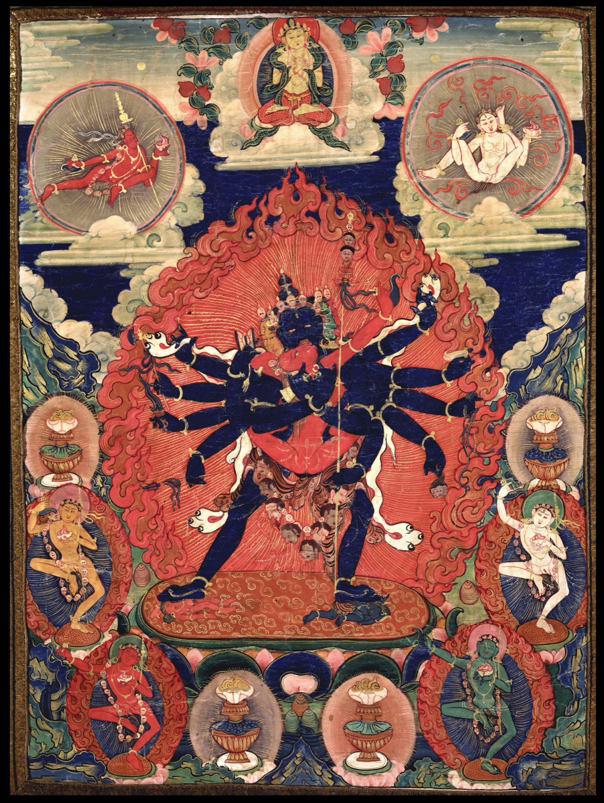 Four-faced twelve-armed Chakrasamvara embracing Vajravarahi — TK0466