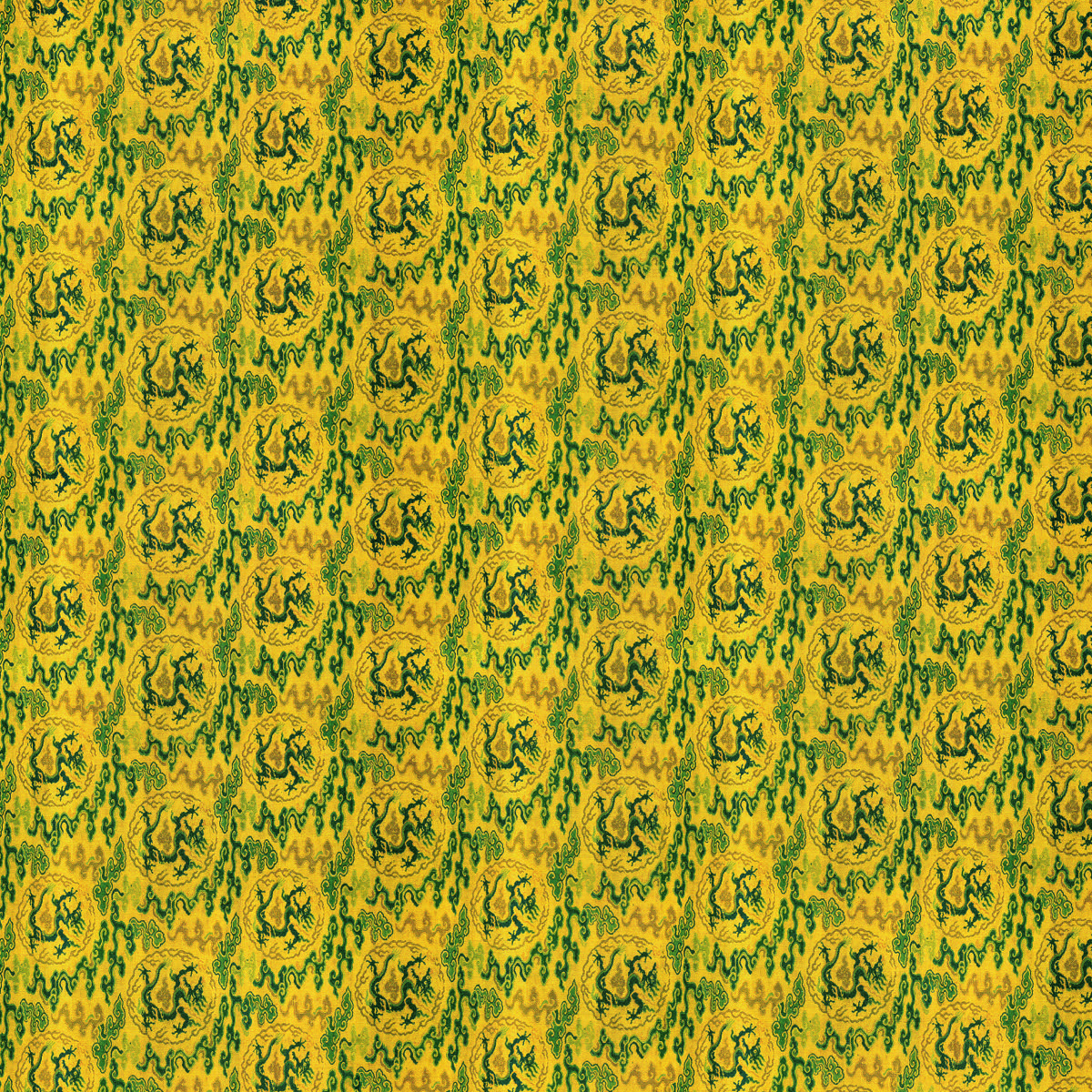Yellow-green patterned Buddhist scroll cover fabric with repeated roundels and scrolling forms — TK0778