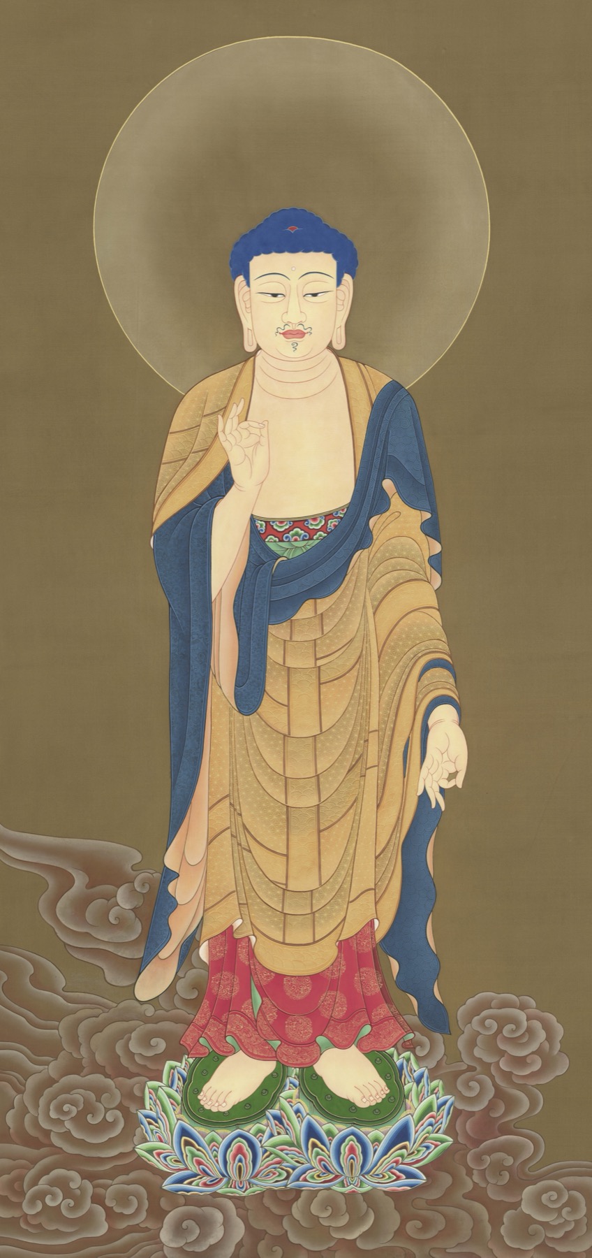 Buddhist painting color palette in TK1110: a standing haloed figure in a warm gold robe and cool blue mantle above red-and-green lotus panels; identity uncertain.